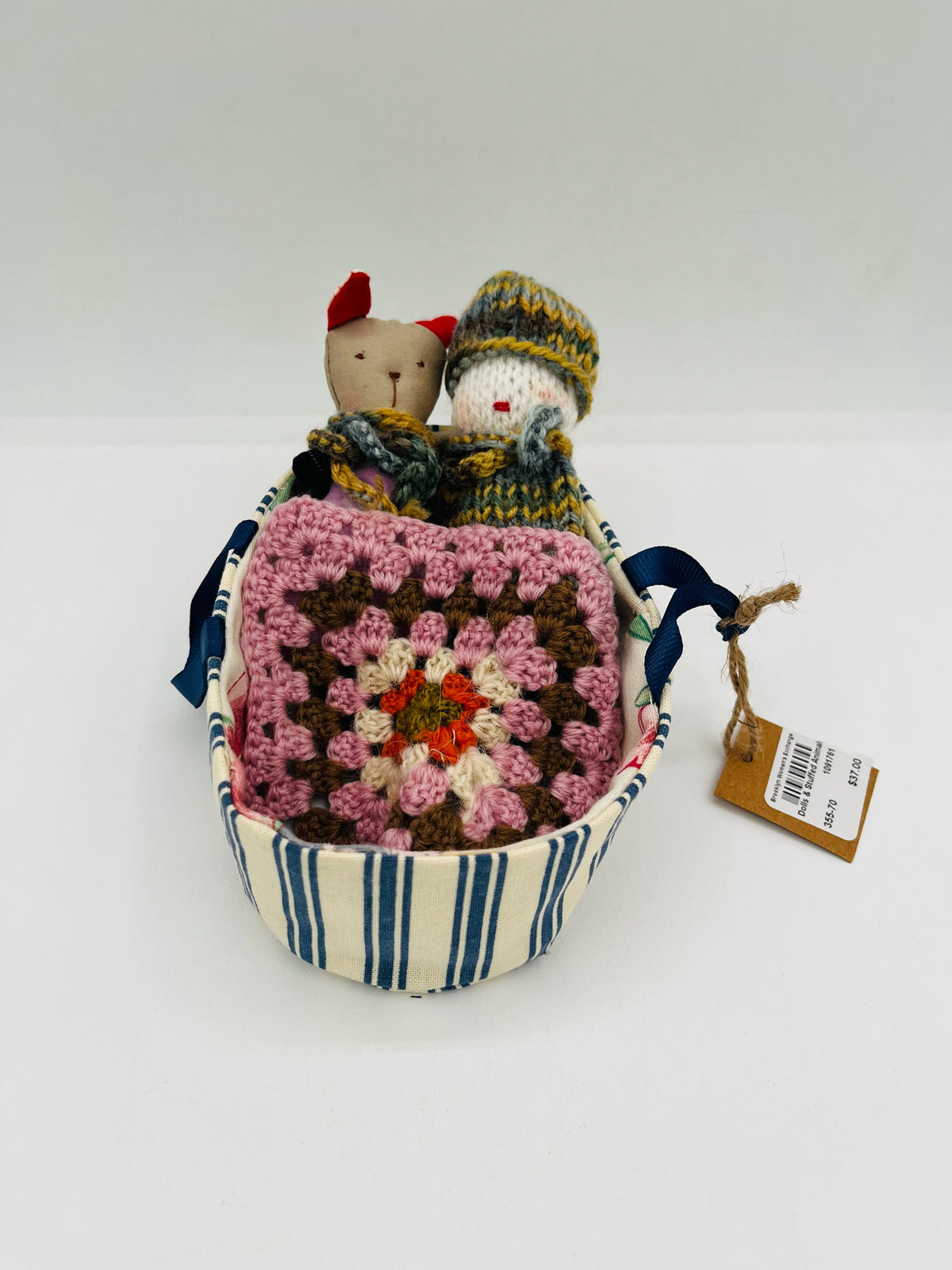 Dolls in Carrier Bag
