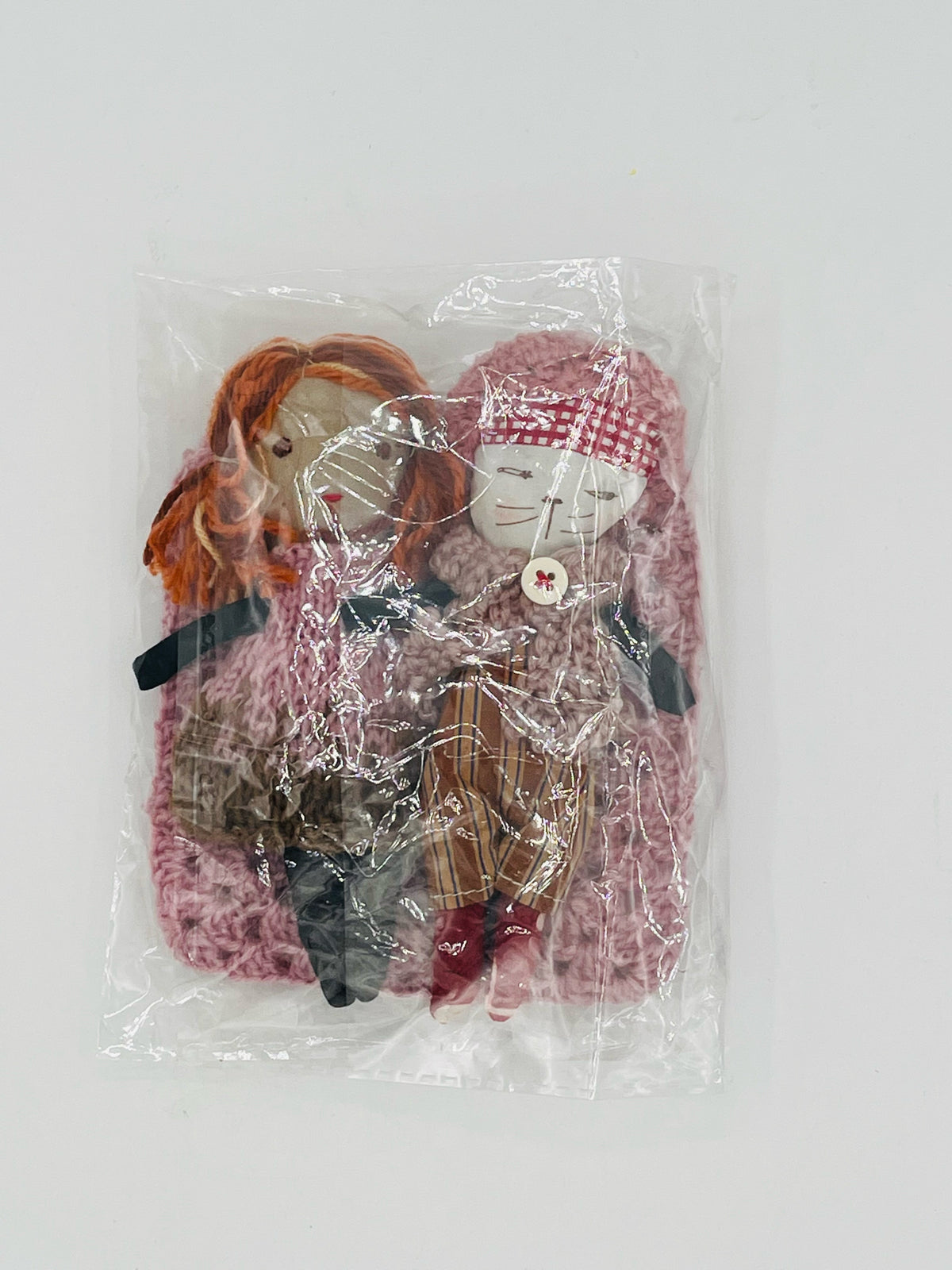 Dolls in Crochet Bag