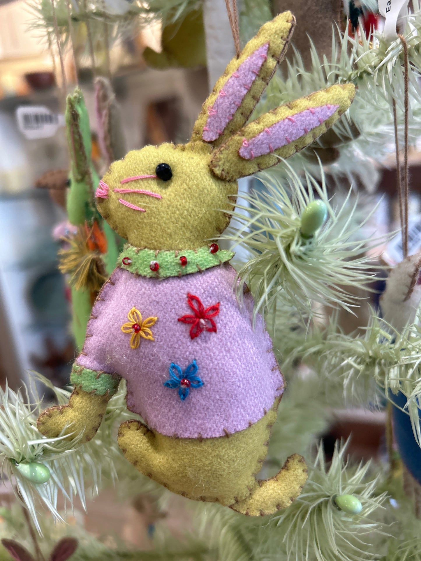 Yellow rabbit with pink dress