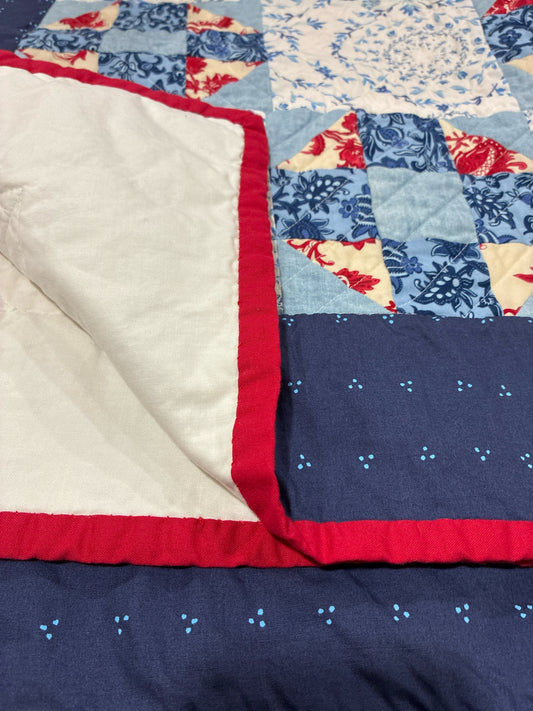 Red, White, Blue Quilt with Blue Floral Border