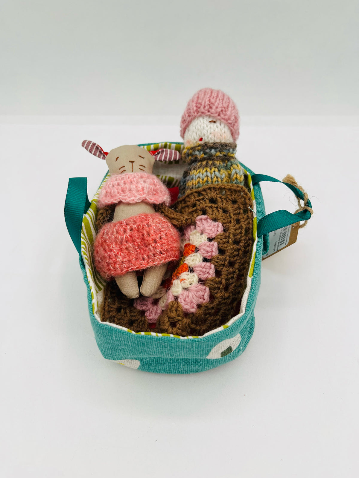 Dolls in Carrier Bag