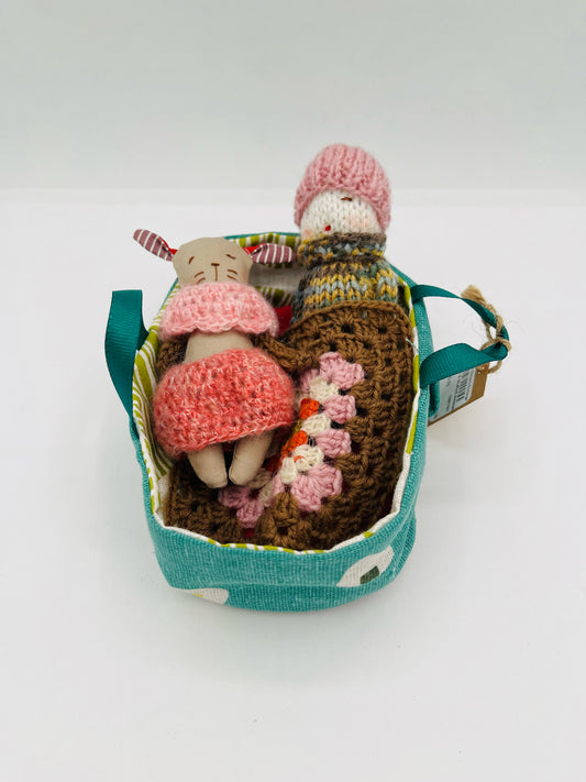 Dolls in Carrier Bag