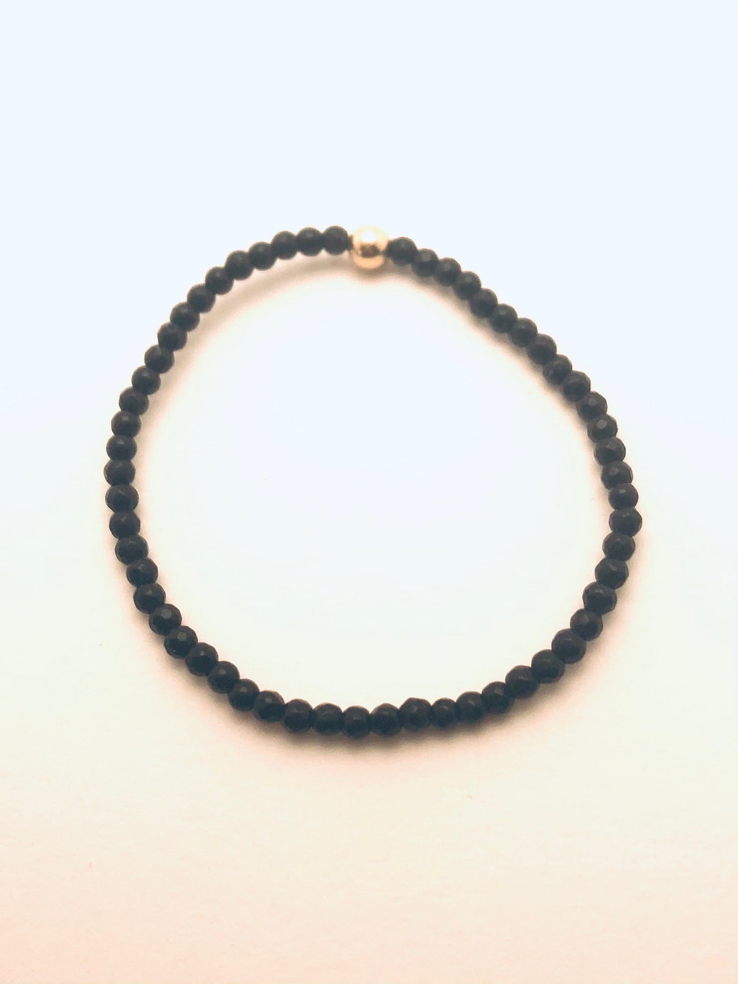 Black Onyx Faceted Small Gold Beaded Bracelet