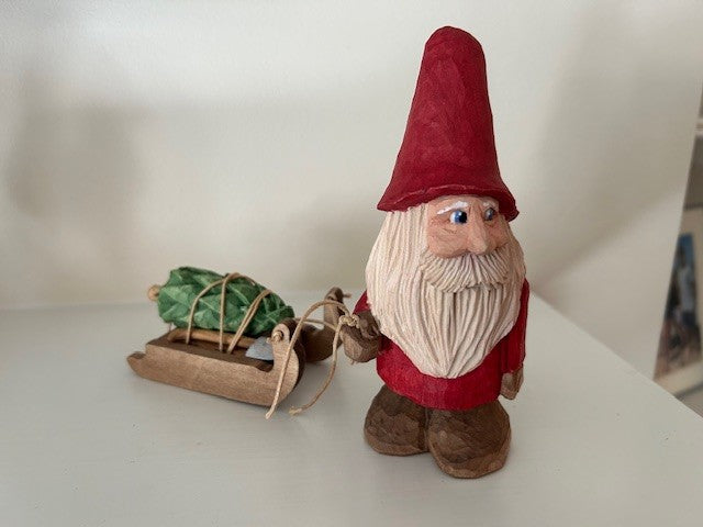 Santa (pulling sled with tree)