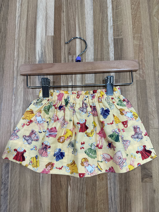 2 Y Twirly Skirt - Pale Yellow w/Paper Dolls