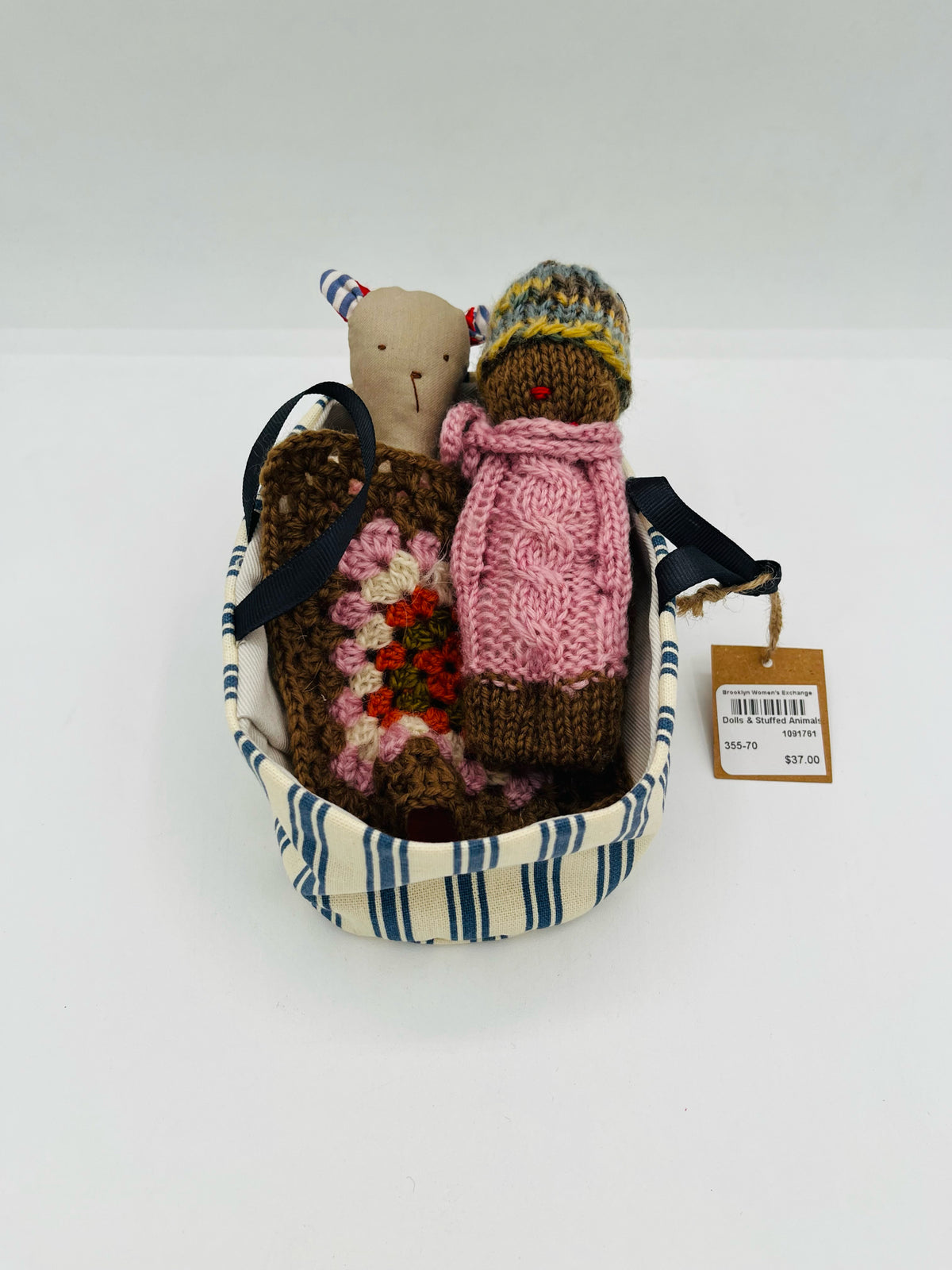 Dolls in Carrier Bag