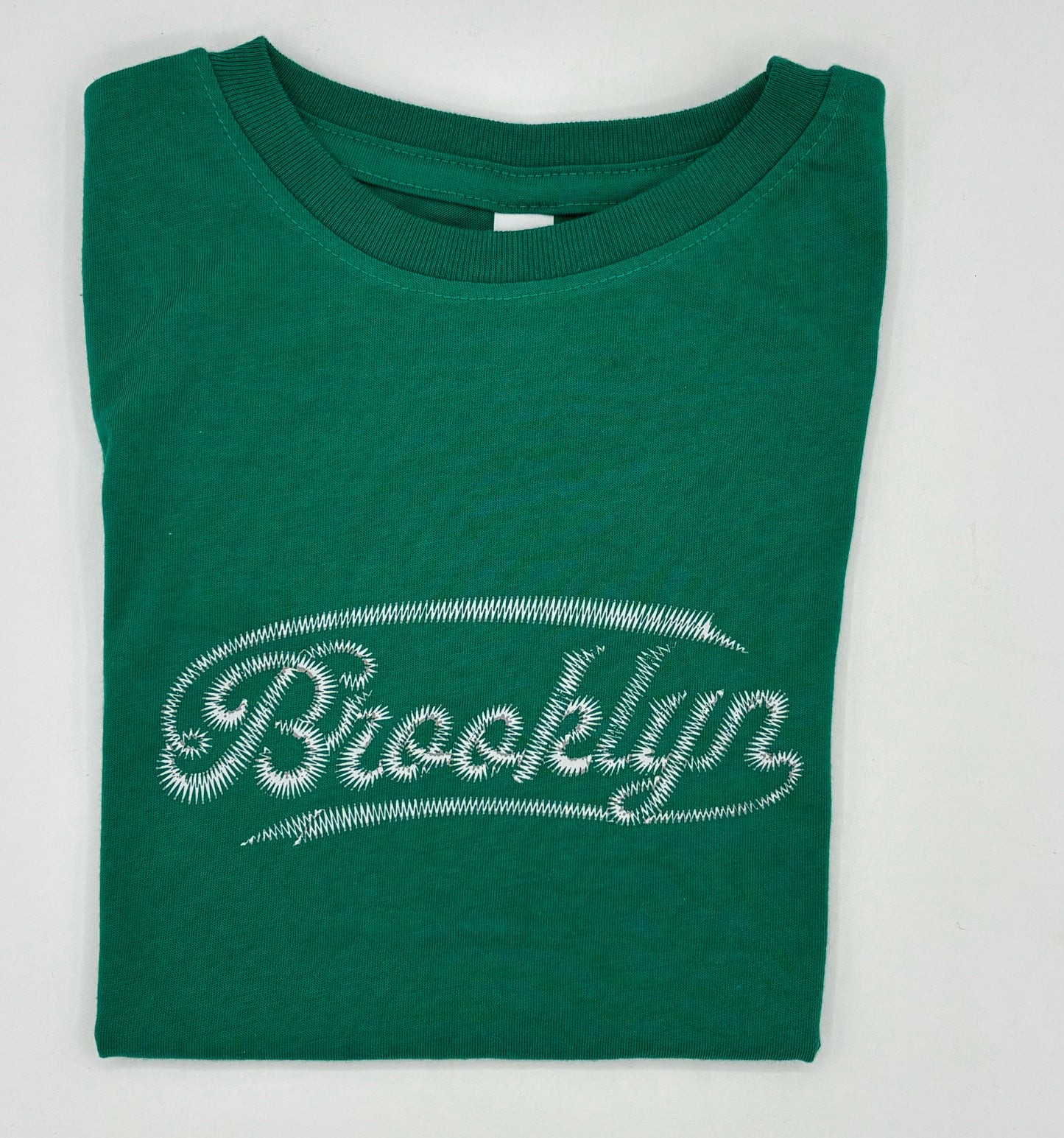 Brooklyn Script Tee White on Green 3Y