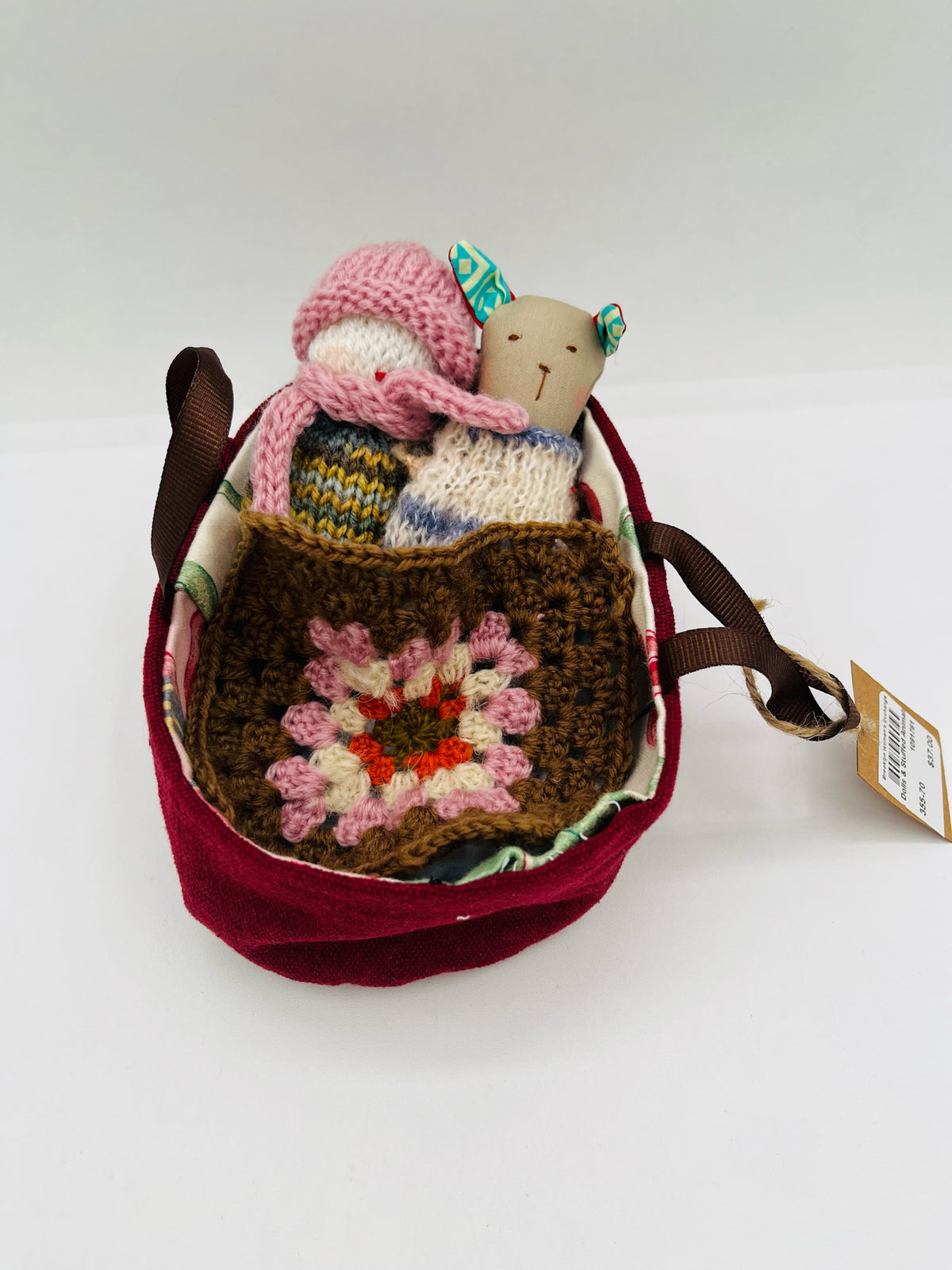 Dolls in Carrier Bag