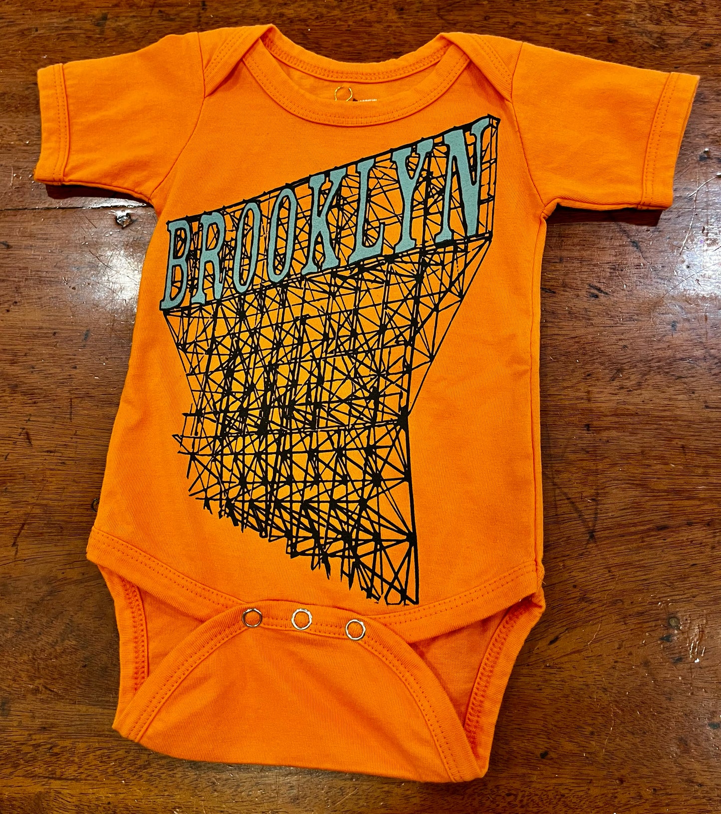 Baby 3-6 M  Orange Brooklyn Scaffold Onesie